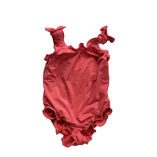 Name it spīdīgs peldkostīms