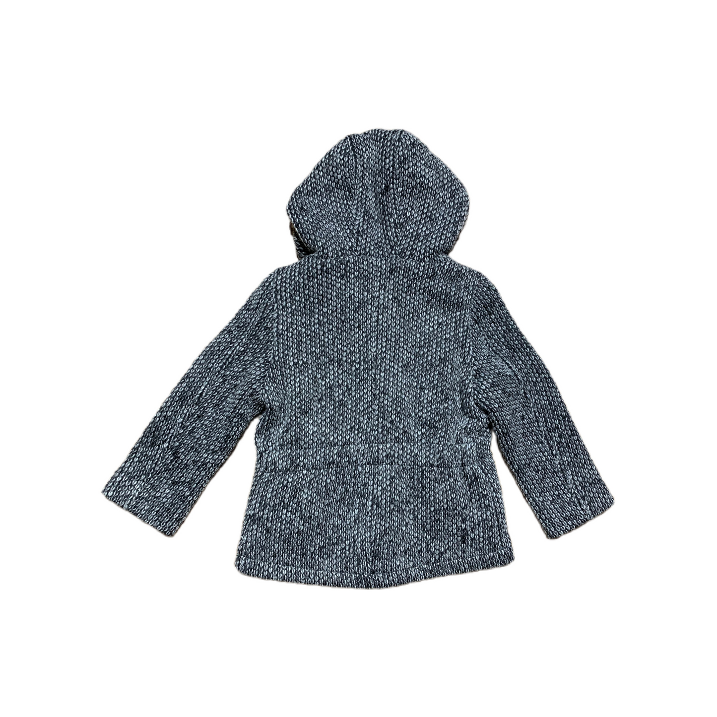 Indexe vilnas mētelis