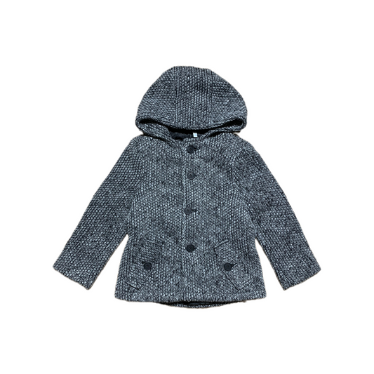 Indexe vilnas mētelis